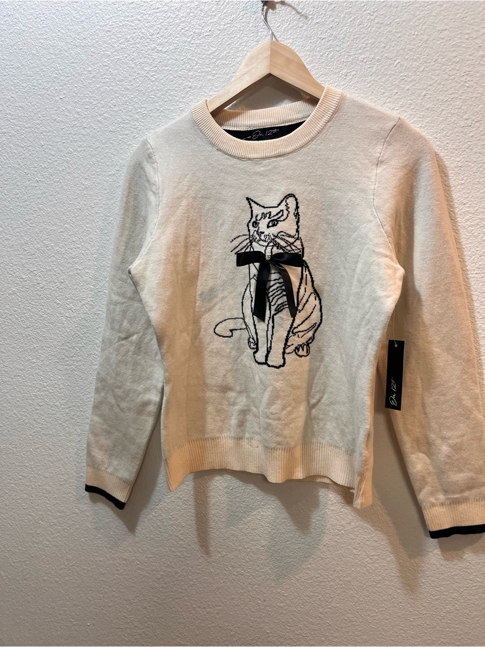 Cream Crewneck Sweater with Black Cat Embroidery and Bow - Women's